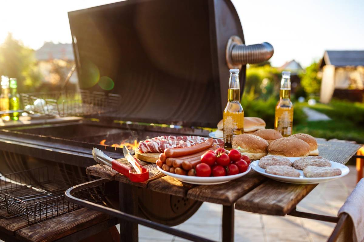 $!Barbecue grill party. Tasty food on wooden desk